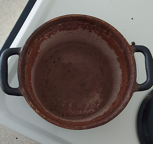 rusty cast iron pot